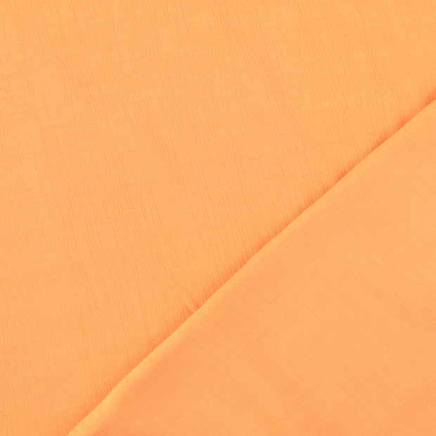 Popeline de Viscose tissu abricot froissé 