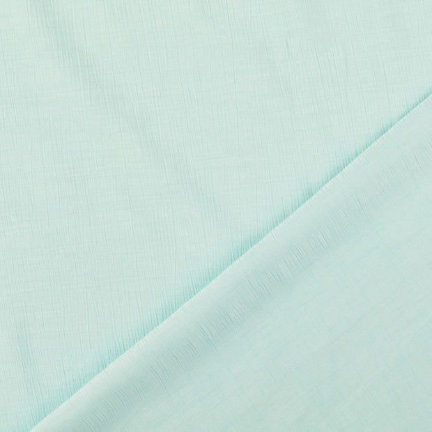 Popeline de Viscose tissu turquoise froissé 