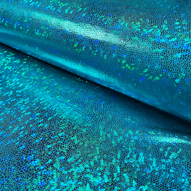 Lamé tissu serpents Bleu Ciel